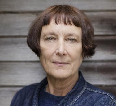 Cornelia Parker wearing a denim jacket